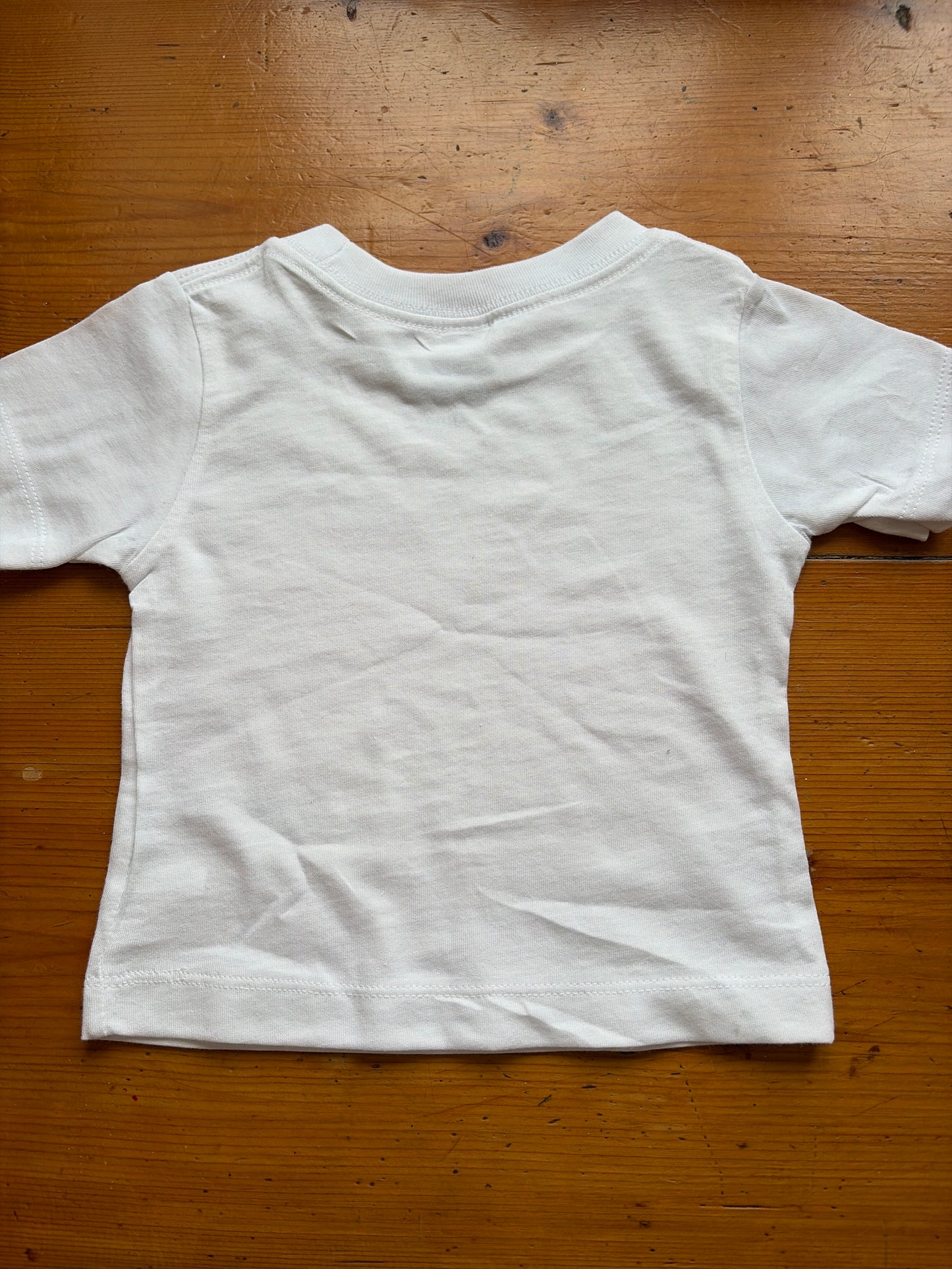 White with turquoise Mordros logo age 3-6 months